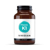 A bottle of Viridian Vitamin K1 50ug with 30 Veg Caps label, indicating it's a vegan product.