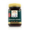 jar of Nelson  Manuka Honey on White Background 